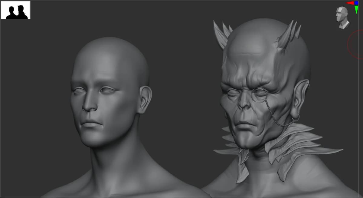 A human head sculpt beside the creature built from it